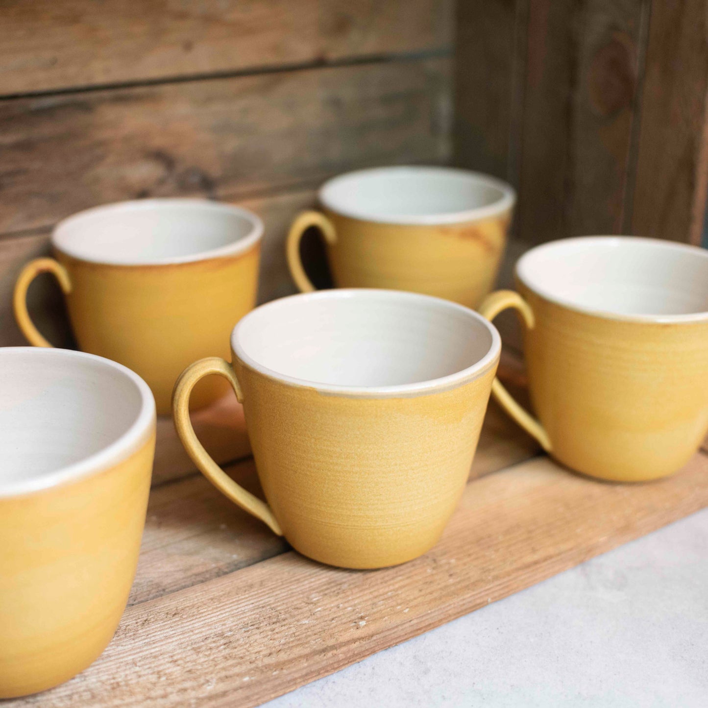 Large flared mug in sunshine ochre glaze - THE BRISTOL ARTISAN