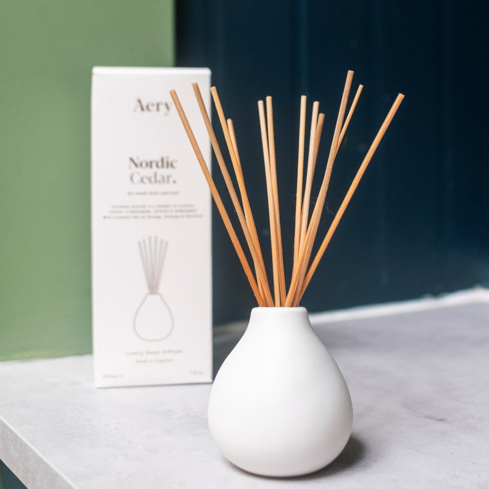 Nordic Cedar Scented Reed Diffuser In A White Reusable Clay Vase