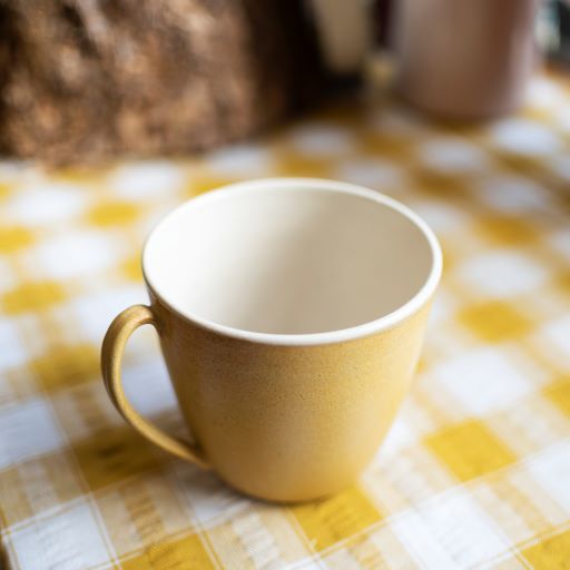 Large flared mug in sunshine ochre glaze - THE BRISTOL ARTISAN