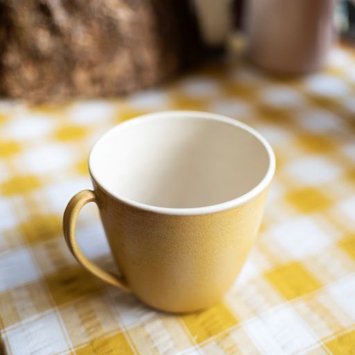 Large flared mug in sunshine ochre glaze - coming soon - The Bristol Artisan Handmade Sustainable Gifts and Homewares.